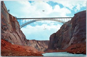 VINTAGE POSTCARD FLAG OVER GLEN CANYON BRIDGE NEAR PAGE ARIZONA