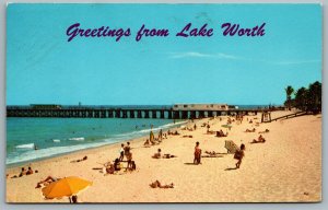 Postcard Lake Worth FL c1971 Greetings from Lake Worth Beach Scene Bathers Pier