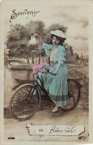 BEAUTIFUL FRENCH WOMAN ON BICYCLE-PREPARES TO DROP HANDKERCHIEF PHOTO POSTCARD