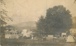 Postcard RPPC C-1910 Carnival tents Hit the hat  23-6511