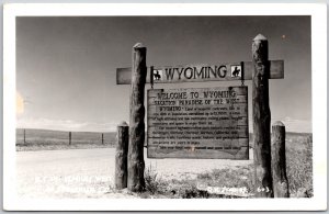 Welcome Sign Wyoming Vacation Paradise Of The West Real Photo RPPC Postcard