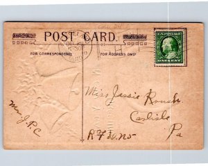 1910 NEW YEAR GREETINGS SILVER BELLS VICTORIAN EMBOSSED POSTCARD