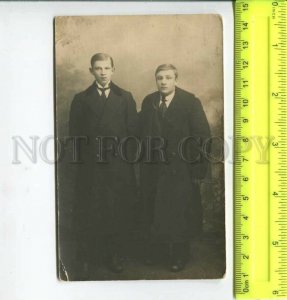 452544 RUSSIA two young men in suits and coats Old photo