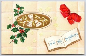 Postcard 1915 For A Jolly Christmas Greetings Open Book & Holly Berries Ribbon