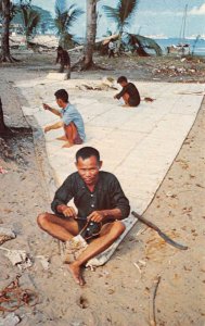 Vung Tau Vietnam Man Repairing Sails on Beach Vintage Postcard AA69278