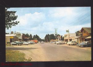 LAND O'LAKES WISCONSIN DOWNTOWN MAIN STREET SCENE OLD CARS VINTAGE POSTCARD