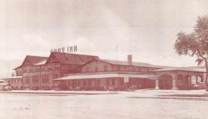 Cody Wyoming Inn Street View Vintage Postcard K63270