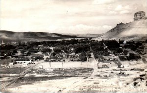 RPPC GREEN RIVER, WY BIRDSEYE VIEW of TOWN, Castle Rock c1940s  Sanborn Postcard