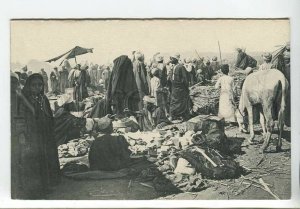 438846 Egypt market in Assuan merchants Vintage postcard