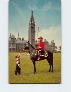 Postcard Mountie at Peace Tower, with Boy in cowboy costume, Ottawa, Canada