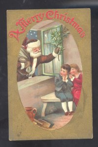 A MERRY CHRISTMAS SANTA CLAUS BROWN ROBE CHILDREN VINTAGE POSTCARD