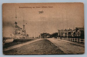 GERMANY BRUNSBUTTELKOOG AM KAISER WILHELM KANAL w/ SHIP ANTIQUE POSTCARD