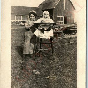 c1910s ID'd Baby & Little Boy Outside RPPC Real Photo Barn Postcard VanDusen A45 