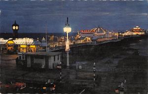 uk4557 car palace pier by night brighton  uk