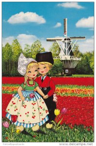 Dutch Children Holding Hands in Tulip Field by Windmill, Holland, Bloemenland...