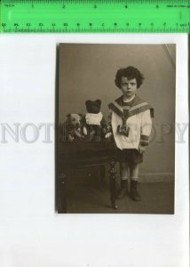 466889 RUSSIA strict little boy with a teddy bear and a dog Vintage photo