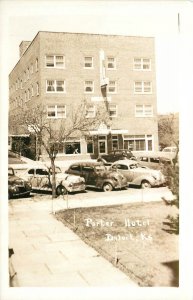 Postcard RPPC 1940s Kansas Beloit Porter Hotel automobiles KS24-759