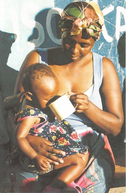 Lot158 cape town south africa woman and child types sip of water breastfeeding