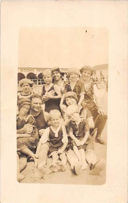 Children and Family on beach wearing swimsuits RPC