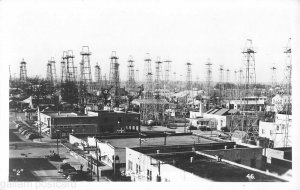  Kilgore Texas Oil wells rigs downtown Rppc postcard 1930-40