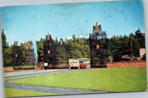 Postcard CA Glendale - Forest Lawn Memorial Park pink car at entrance