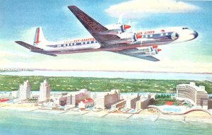 1950s EASTERN AIR LINES GOLDEN FALCON DC-7B IN FLIGHT POSTCARD P1437