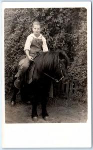 RPPC  Young BOY RIDING BLACK PONY ca 1920s-40s  Real Photo  Postcard