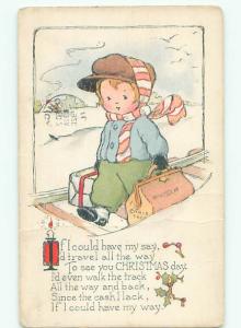 Pre-Linen christmas BOY CARRIES SUITCASE AND GIFT ALONG THE TRAIN TRACKS J1461