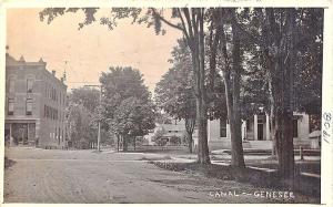 Genesee NY Dirt Street Canal Bicycle in 1909 RPPC Postcard