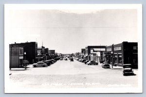 J90/ Lemmon South Dakota Postcard RPPC c1950s Main Street Stores  645