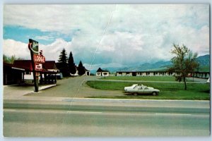 Bozeman Montana MT Postcard Alpine Lodge Motel Cars Trees Street View Vintage