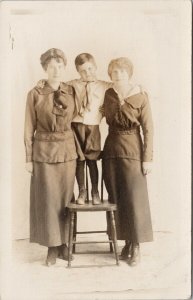 Young Boy with Two Women Ladies Girls Siblings ?? Unused Real Photo Postcard G89