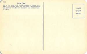 Curio Store, Tijuana, BC, Mexico Postcard Rack 1950s Vintage Postcard