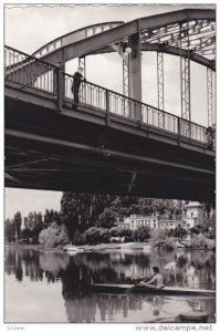 RP: Crew Boat going under bridge on Danube River , GYOR , Hungary , 1930-40s