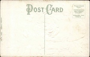 Christmas Santa Claus Holly Gilt Embossed c1900s-20s Postcard