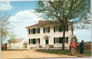 Old Sturbridge Village Salem Towne House -woman talking to guest - Massachusetts