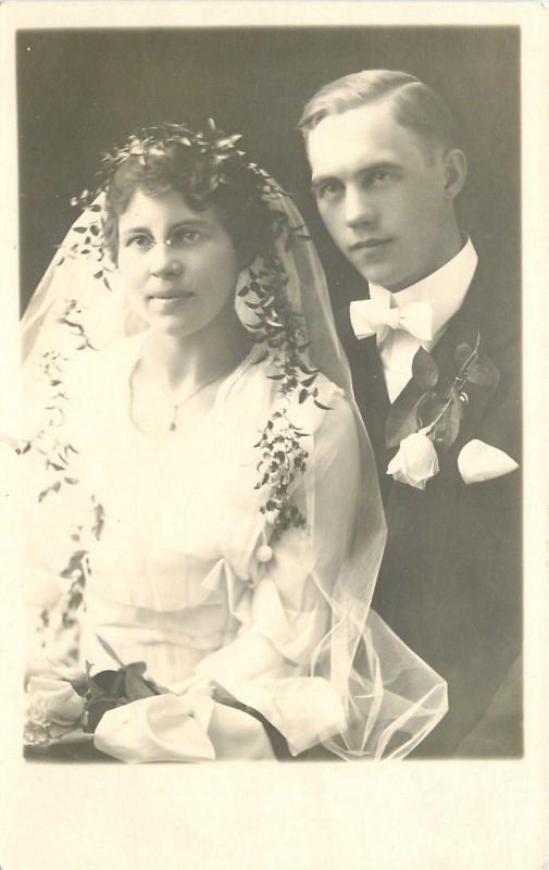 Bride & Groom in Wedding Attire~Red Rose~White Rose Boutonnière~RPPC 1916 