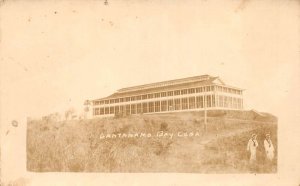 Guantanamo Bay Cuba Building and Sailors Real Photo Vintage Postcard AA66828