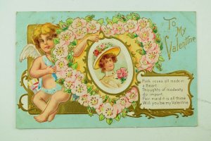 C.1910 Embossed Valentine's Postcard Cupid Heart Wreath Of Flowers Poem F31