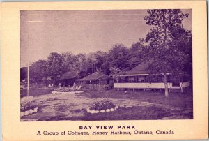 Postcard ON Honey Harbour Bay View Park Group of Cottages Flower Beds 1940s K70