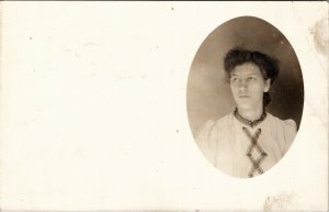 RPPC Young Woman Sad Face Cross Pattern Blouse Masked Oval Portrait Postcard U16