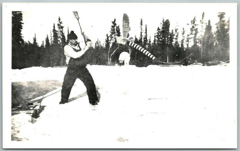 MAN FIGHTING MOSQUITO EXAGGERATED VINTAGE REAL PHOTO POSTCARD RPPC