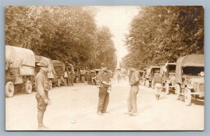 BEDFORD PA US ARMY TRUCKS w/ SIGNS & SOLDIERS ANTIQUE REAL PHOTO POSTCARD RPPC