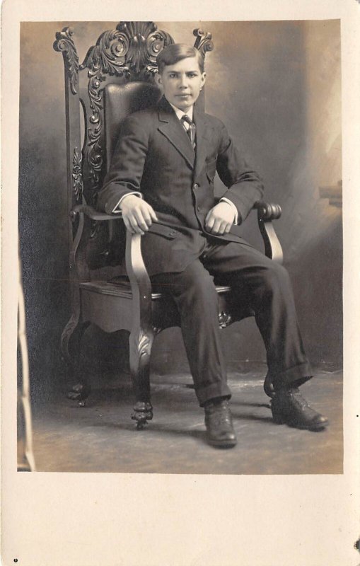 c1910 RPPC Real Photo Postcard Young man Suit In Ornate Chair 