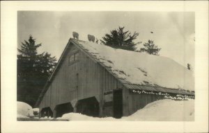 Sitka AK Goats on Peak of Barn Roof in Winter Real Photo Postcard