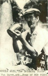 Uncle Slug Drinking Uncle Van Buren Arkansas 1944 RPPC Photo Postcard 20-7868
