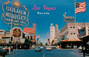 Postcard Las Vegas NV Fremont Street Scene Golden Nugget Apache US Flag 1950s