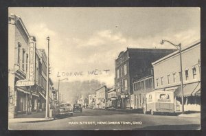 NEWCOMERSTOWN OHIO DOWNTOWN MAIN STREET SCENE OLD CARS VINTAGE POSTCARD