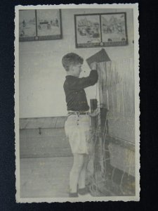 Netherlands YOUNG BOY WORKING A LOOM - WEAVING CLOTH TAPESTRY Old RP Postcard