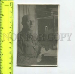 452378 USSR soldier at the bookcase Old photo